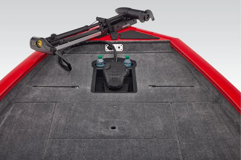 Slide: The Image of 2026 Tracker Pro Team 190 boat with seating and console, parked outdoors. - 15