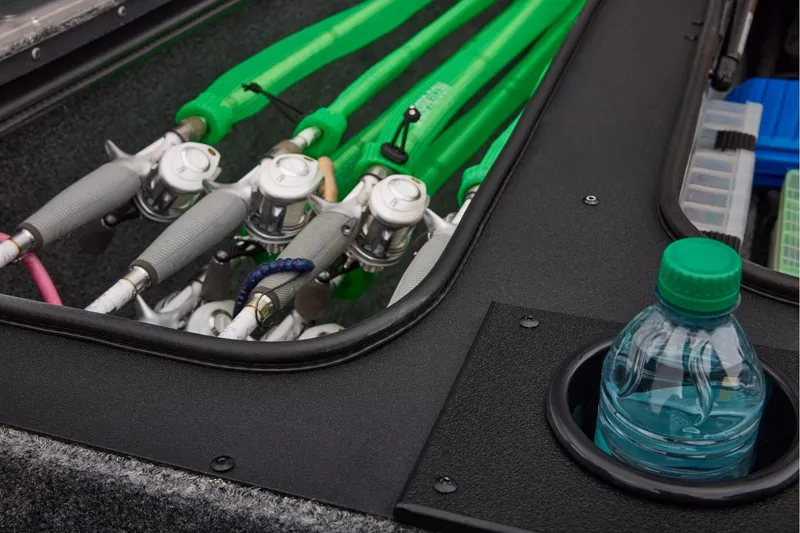 Slide: The Image of 2026 Tracker Pro Team 190 boat storage compartment with open lid. - 20