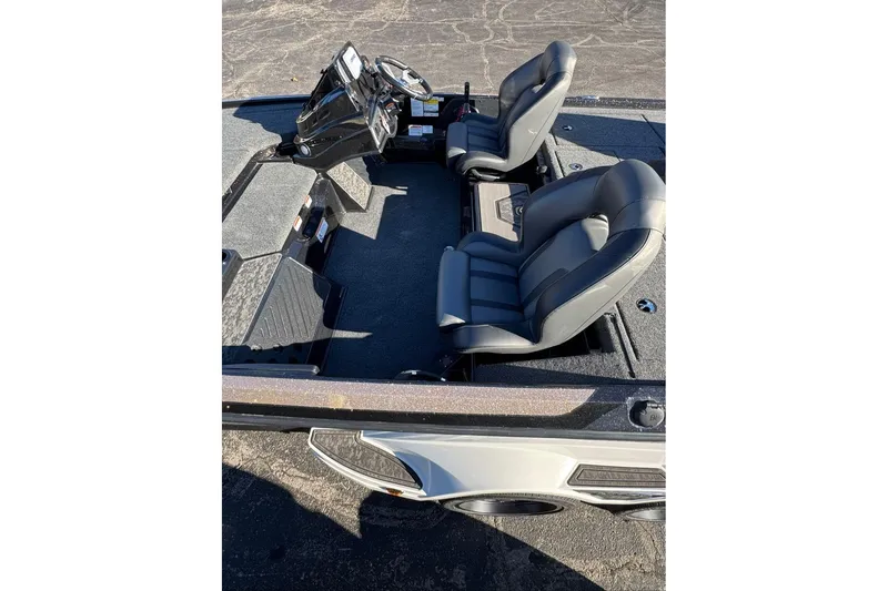 Slide: The Image of 2026 Nitro Z19 XL boat interior with dual seats and steering console. - 10