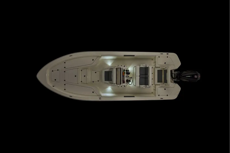 Slide: The Image of Top view of 2026 Mako 24 APEX boat with illuminated deck and outboard motor. - 21