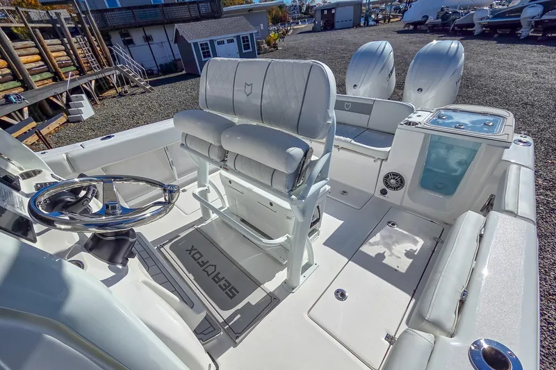 Slide: The Image of 2026 Sea Fox 268 Commander boat interior with dual engines and modern seating. - 10