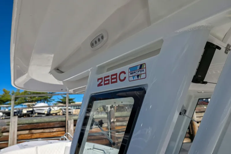 Slide: The Image of 2026 Sea Fox 268 Commander boat detail with logo and model number. - 13