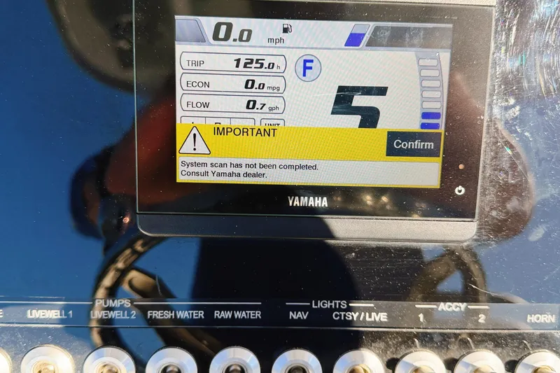 Slide: The Image of Yamaha display on 2021 Sea Pro 248 Bay boat showing system scan alert. - 6