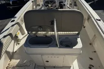 Slide: The Image of 2018 Carolina Skiff Ultra Series boat interior with open storage compartments. - 8