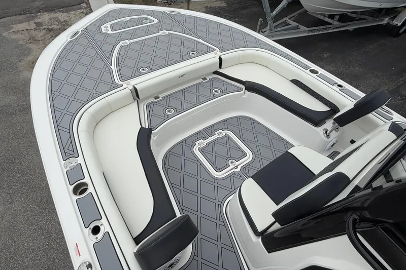 Slide: The Image of 2024 Tidewater 2500 Carolina Bay boat interior with sleek seating and modern design. - 4