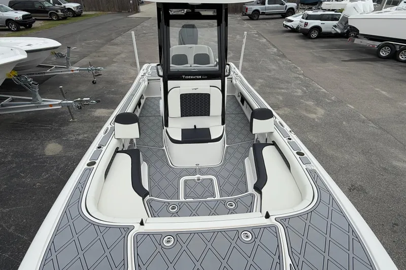 Slide: The Image of 2024 Tidewater 2500 Carolina Bay boat interior with sleek seating and modern design. - 5
