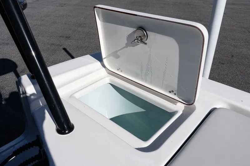 Slide: The Image of Open storage compartment on 2026 Sea Pro 172 Bay boat. - 13