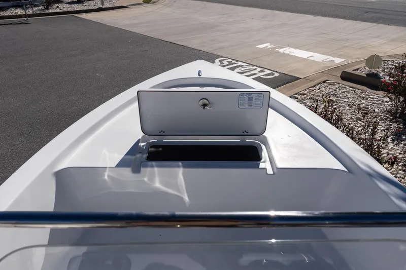 Slide: The Image of 2026 Sea Pro 172 Bay boat with open storage compartment on deck. - 14