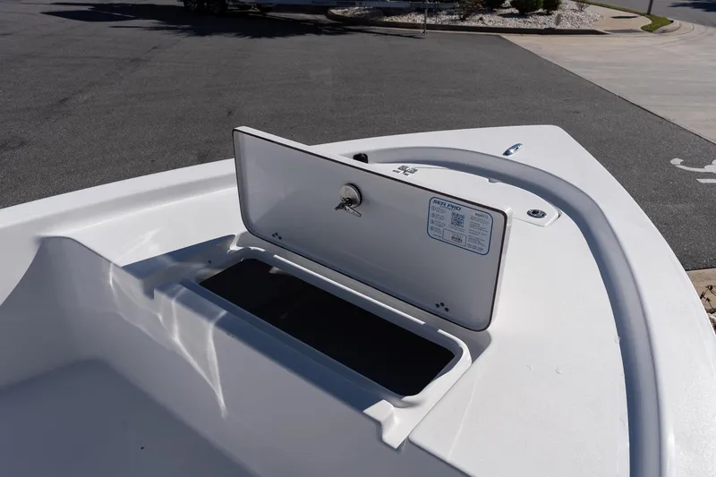 Slide: The Image of 2026 Sea Pro 172 Bay boat with open storage compartment on deck. - 15
