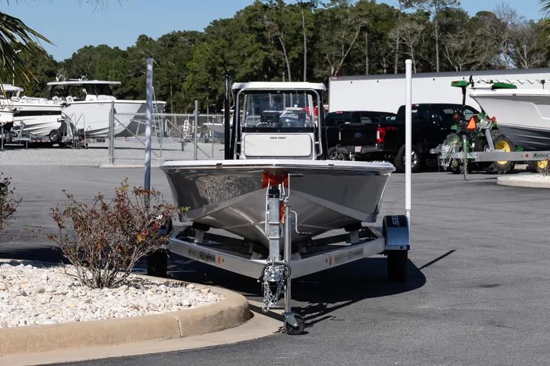 Slide: The Image of 2026 Sea Pro 172 Bay boat on trailer in a marina parking lot. - 4