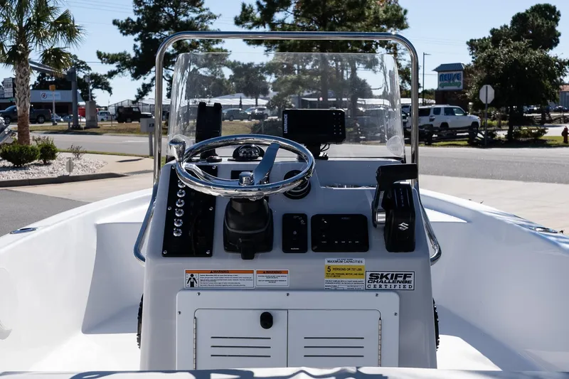 Slide: The Image of 2026 Sea Pro 172 Bay boat console with steering wheel and controls. - 9