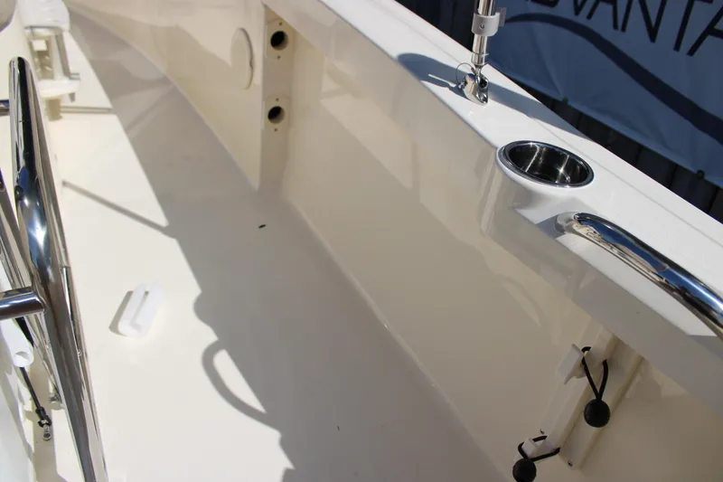Slide: The Image of 2026 Scout 188 Sportfish boat interior with stainless steel features and cup holder. - 25