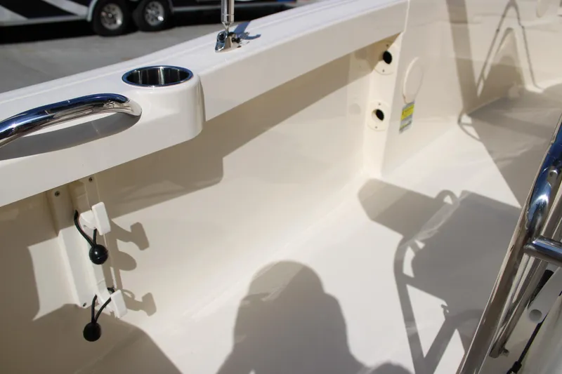 Slide: The Image of Interior view of 2026 Scout 188 Sportfish boat, featuring sleek design and stainless steel fixtures. - 26