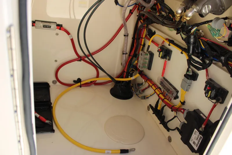 Slide: The Image of Electrical wiring and components inside a 2026 Scout 188 Sportfish boat. - 27