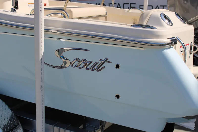 Slide: The Image of 2026 Scout 188 Sportfish boat with sleek design and chrome accents. - 4