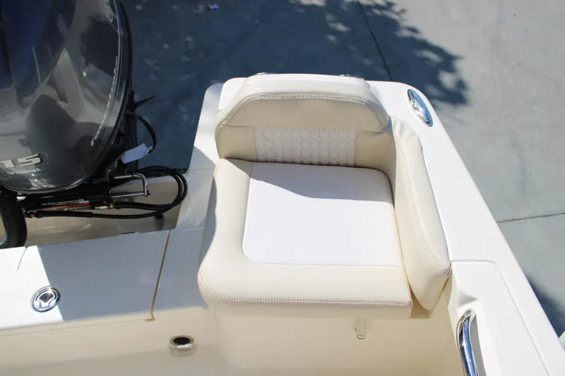 Slide: The Image of 2026 Scout 188 Sportfish boat seat and engine detail, showcasing luxury design. - 8