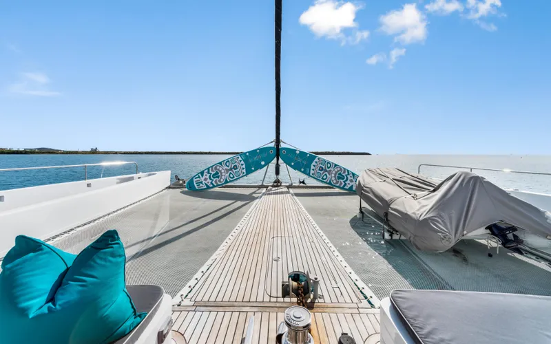 Slide: The Image of Luxurious 2013 Two Oceans OPEN OCEAN 750S yacht deck with turquoise cushions and clear blue skies. - 10