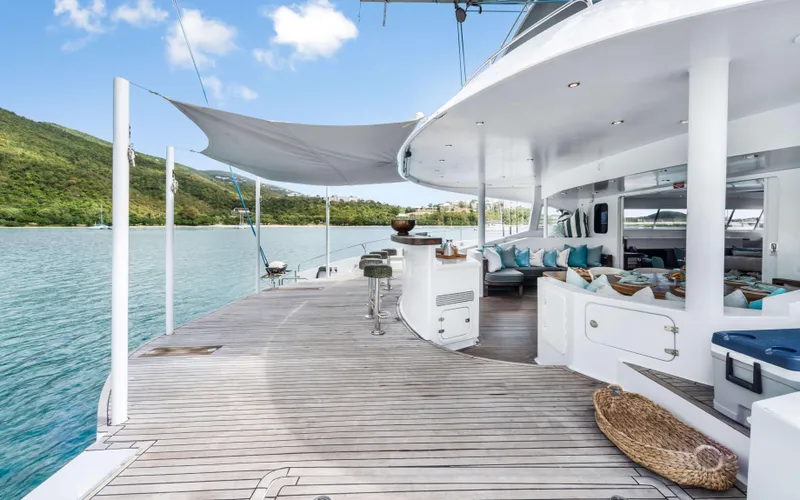 Slide: The Image of Luxurious 2013 Two Oceans OPEN OCEAN 750S yacht deck with seating, ocean view, and canopy. - 17