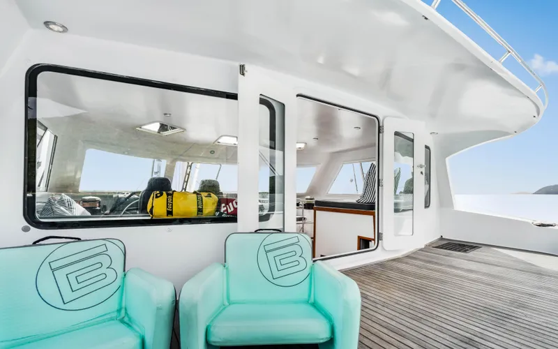 Slide: The Image of Luxurious 2013 Two Oceans OPEN OCEAN 750S yacht deck with seating and ocean view. - 26