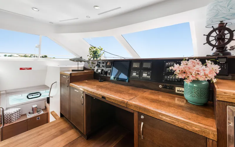 Slide: The Image of Luxurious interior of 2013 Two Oceans OPEN OCEAN 750S yacht with wooden finishes and floral decor. - 39