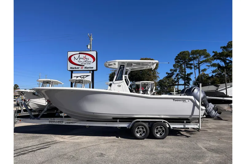 The Image of 2026 Tidewater 256 LXF boat on trailer at Marker 17 Marine dealership. - 0
