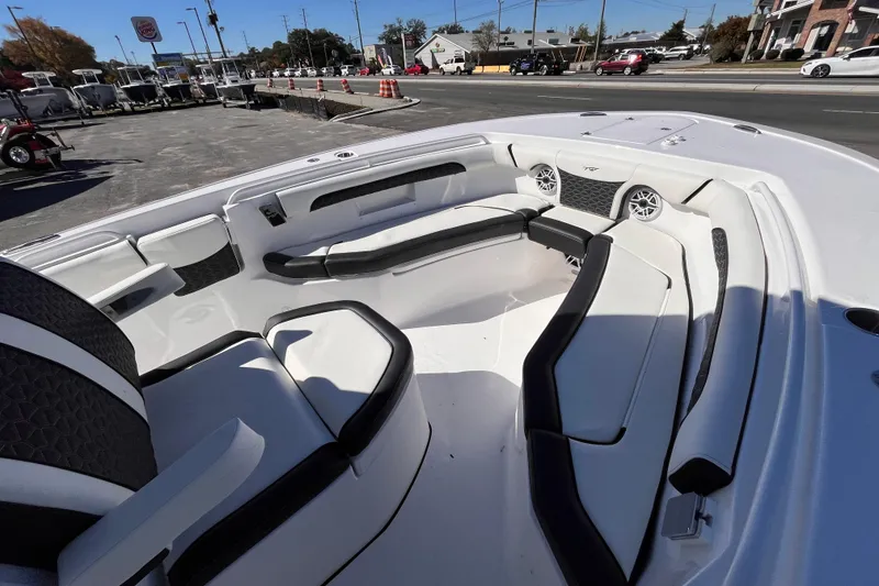 Slide: The Image of 2026 Tidewater 256 LXF boat interior with sleek seating and modern design. - 13