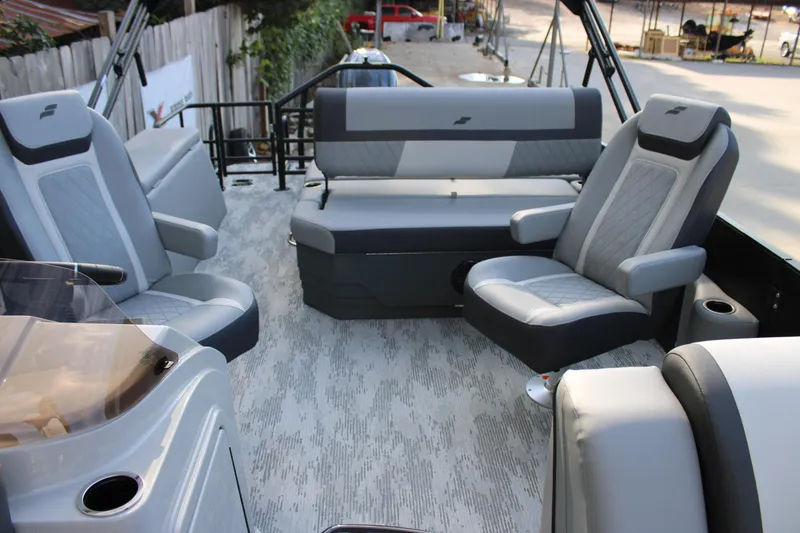 Slide: The Image of Luxurious interior of 2026 Starcraft EXS 1 Q DH boat with plush seating. - 16
