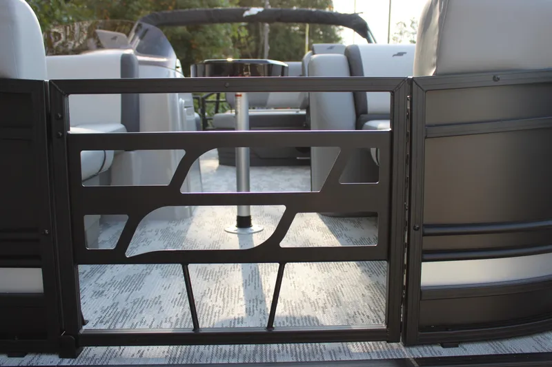 Slide: The Image of 2026 Starcraft EXS 1 Q DH boat interior with modern seating and sleek design. - 30