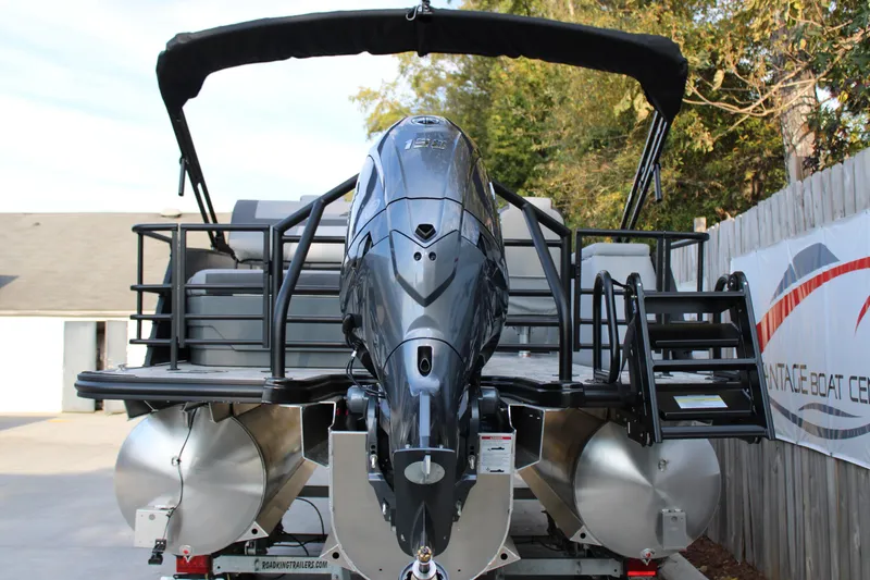 Slide: The Image of 2026 Starcraft EXS 1 Q DH pontoon boat with powerful outboard motor. - 5