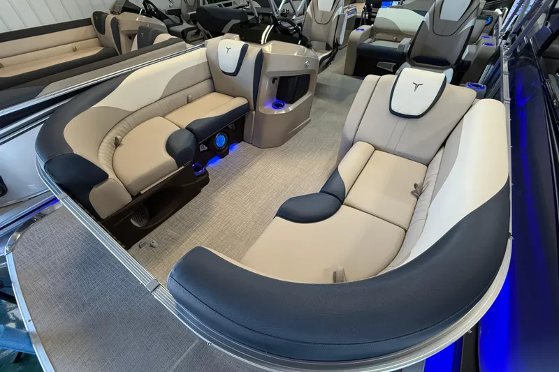 Slide: The Image of 2026 Tahoe Pontoon LTZ Quad Lounger Shift interior with luxurious seating and modern design. - 1
