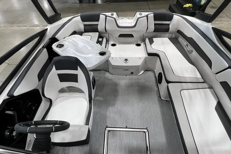 Slide: The Image of 2025 Yamaha Boats AR195 interior with sleek seating and modern design. - 4