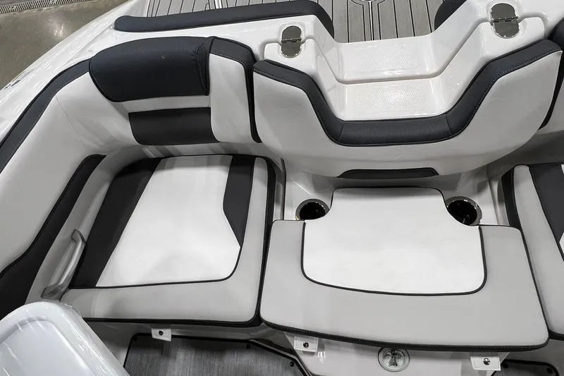 Slide: The Image of 2025 Yamaha Boats AR195 interior seating with sleek, modern design and comfortable upholstery. - 7