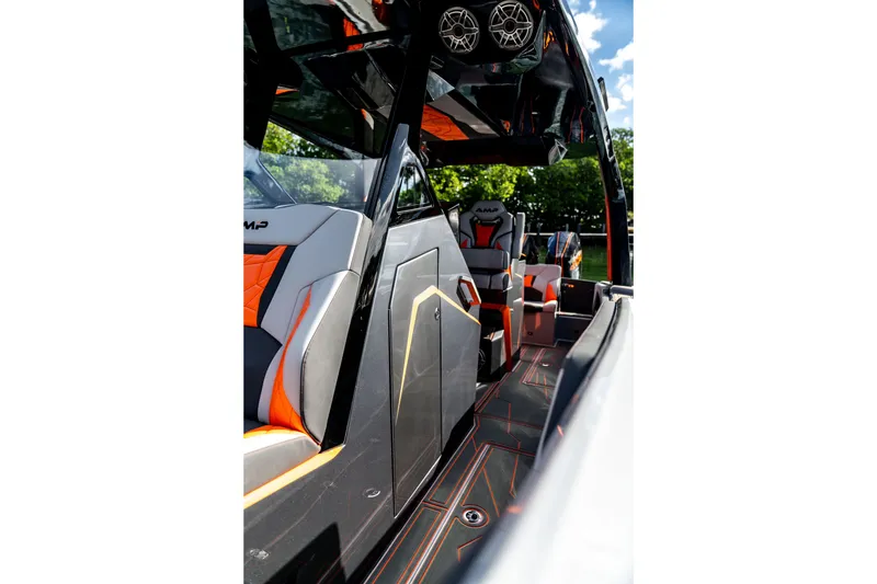 Slide: The Image of Interior of 2026 AMP 333 boat with modern seating and sleek design. - 19