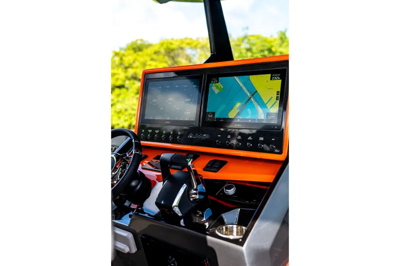 Slide: The Image of High-tech dashboard of AMP 333, 2026 model, featuring dual navigation screens and controls. - 27