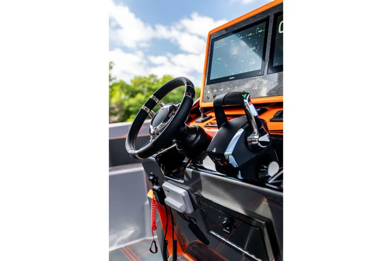 Slide: The Image of Steering wheel and dashboard of AMP 333 boat, 2026 model, with dual screens. - 30