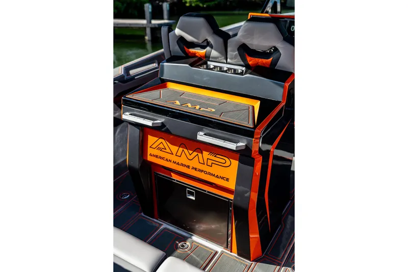 Slide: The Image of 2026 AMP 333 boat interior with sleek design and vibrant orange accents. - 34