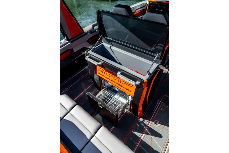 Slide: The Image of Open storage compartment in AMP 333 boat, 2026 model, with sleek interior design. - 37