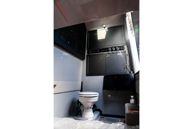Slide: The Image of Interior of AMP 333, 2026 model, featuring a compact bathroom with modern fixtures. - 50