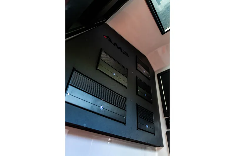 Slide: The Image of Interior view of AMP 333 (2026) showcasing advanced audio system installation. - 51