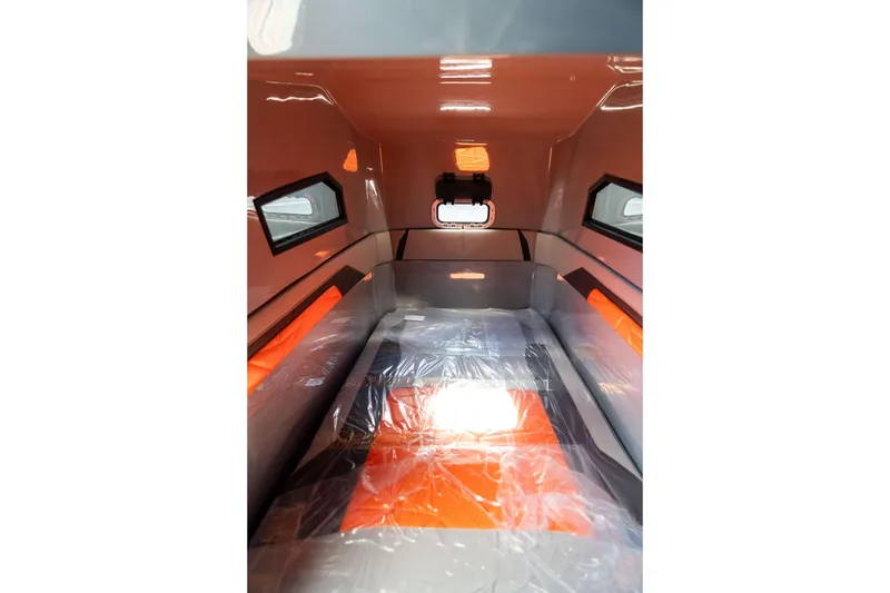 Slide: The Image of Interior of AMP 333, 2026 model, featuring sleek design and modern windows. - 53