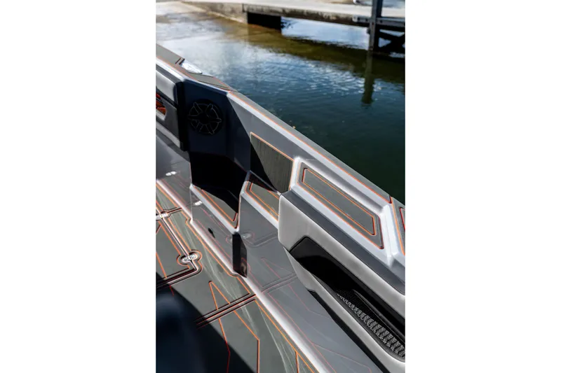 Slide: The Image of Interior of AMP 333 boat, 2026 model, featuring sleek design and modern detailing by the water. - 55