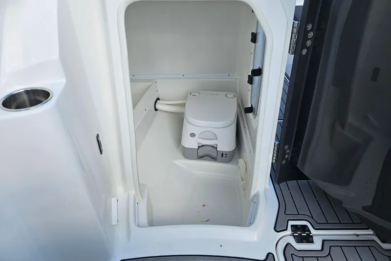Slide: The Image of 2022 Monterey M-45 boat interior with compact marine toilet. - 14
