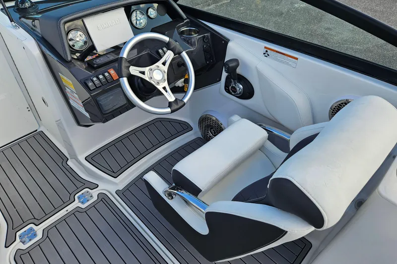 Slide: The Image of Cockpit of 2022 Monterey M-45 boat with steering wheel and control panel. - 15