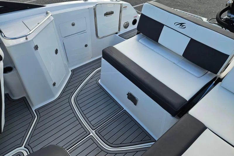 Slide: The Image of 2022 Monterey M-45 boat interior with sleek seating and modern design. - 20