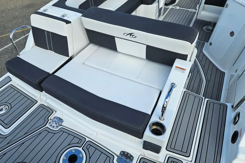 Slide: The Image of 2022 Monterey M-45 boat interior with sleek seating and modern design. - 23