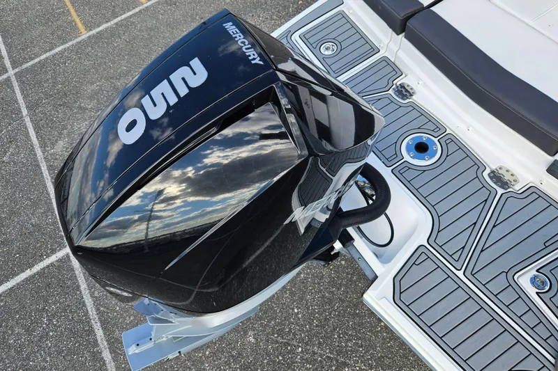 Slide: The Image of 2022 Monterey M-45 boat with Mercury outboard engine, featuring sleek design and modern deck. - 25