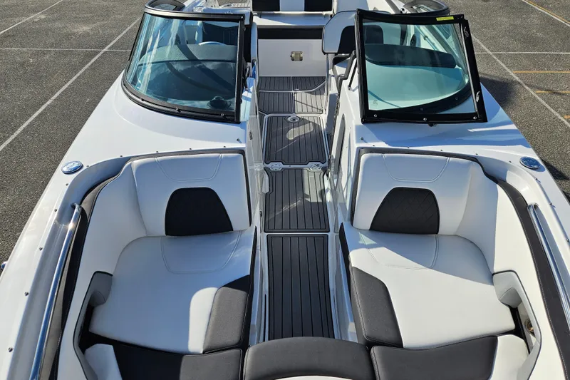 Slide: The Image of 2022 Monterey M-45 boat interior with sleek seating and open windshield design. - 8