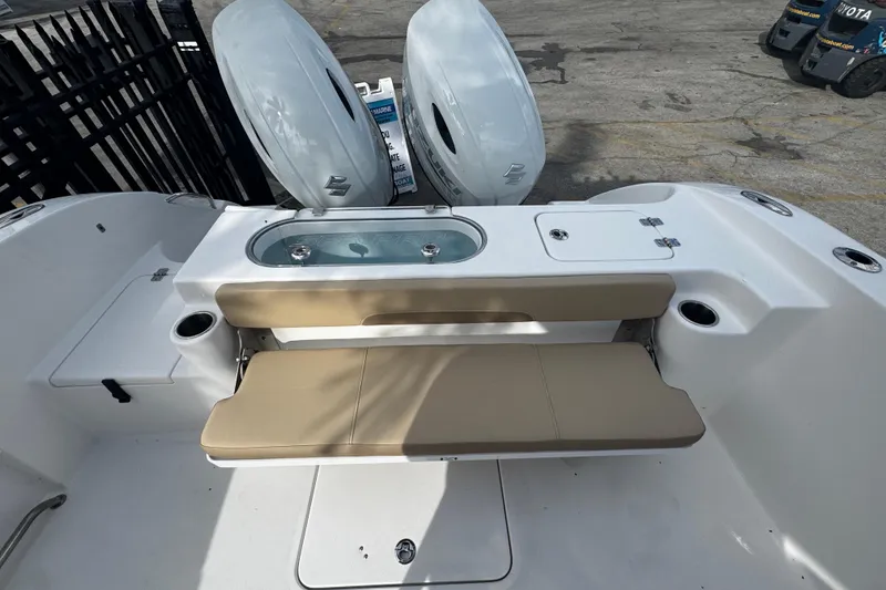 Slide: The Image of 2026 Sea Pro 262 Offshore boat with dual engines and beige seating. - 6