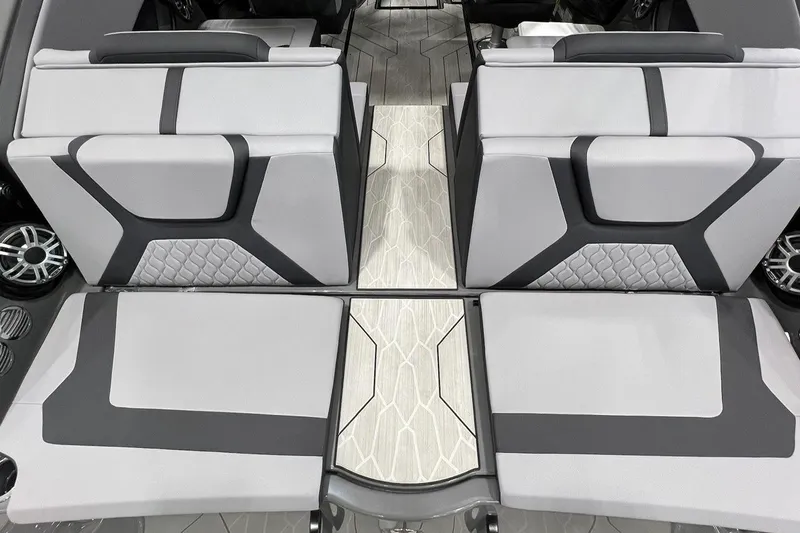 Slide: The Image of 2025 Yamaha Boats 222XD interior with modern seating and stylish design. - 5