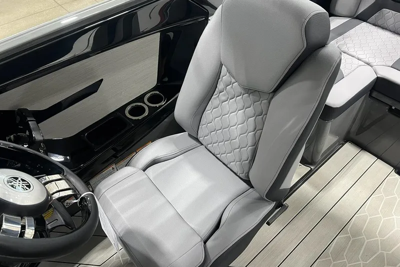 Slide: The Image of 2025 Yamaha Boats 222XD interior with sleek gray seating and modern design. - 7
